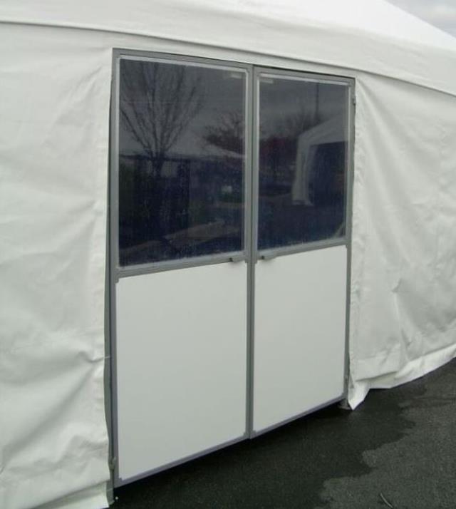 Pole tent double doors with windows, on concrete.