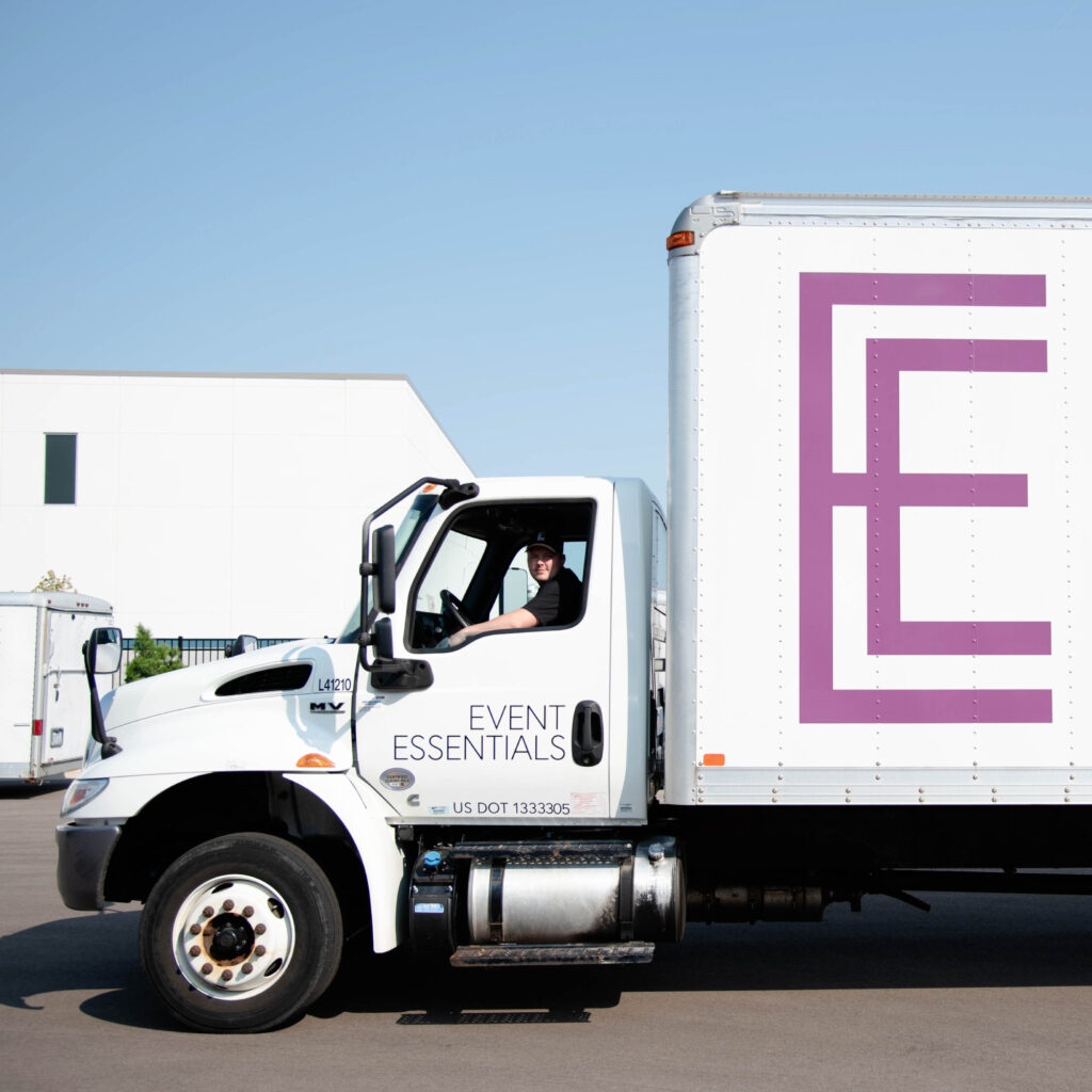 Event Essentials truck being driven towards event site.